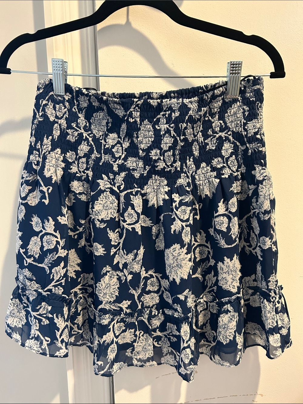 Aqua Bloomingdale’s Navy and White Floral Smocked Ruffle Mini Skirt, size M